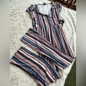 Derek Heart jumpsuit. Blue and orange. Wrap top with ties. Size large.